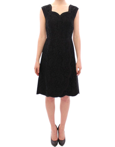 Black floral lace Sicily runway dress by Dolce & Gabbana, featuring intricate lace details and a fitted silhouette.