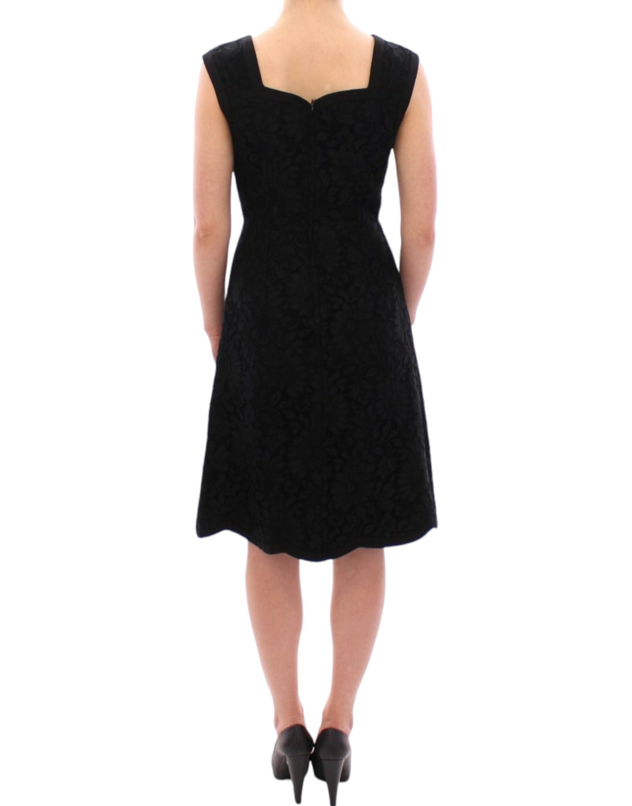 Black floral lace Sicily runway dress by Dolce & Gabbana, featuring intricate lace details and a fitted silhouette.