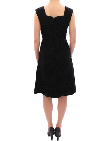 Black floral lace Sicily runway dress by Dolce & Gabbana, featuring intricate lace details and a fitted silhouette.