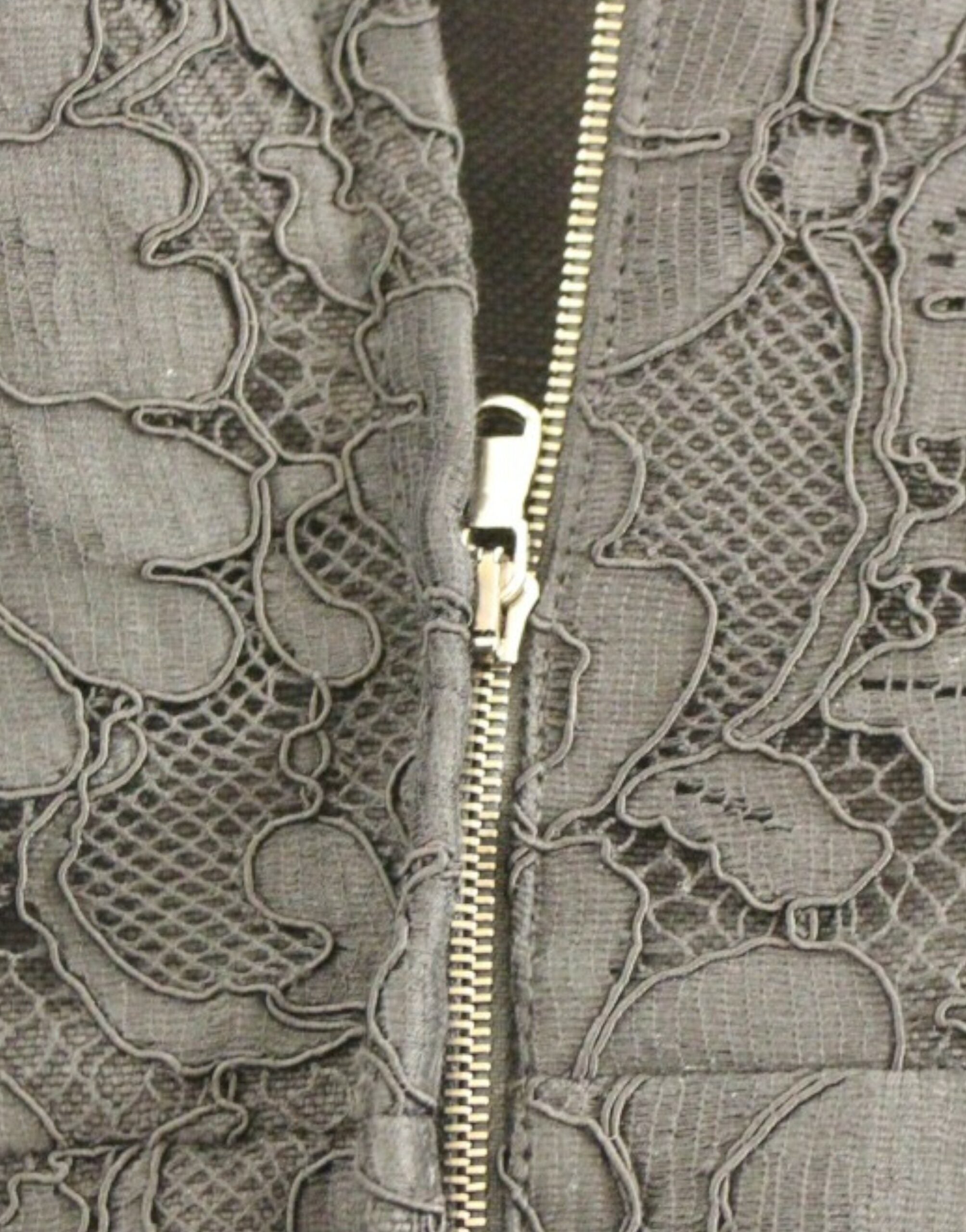 Black floral lace Sicily runway dress by Dolce & Gabbana, featuring intricate lace detailing and elegant fit.