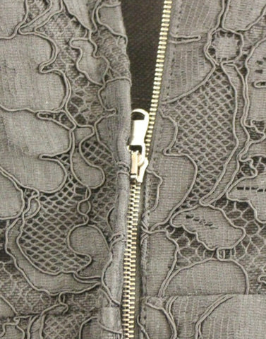 Black floral lace Sicily runway dress by Dolce & Gabbana, featuring intricate lace detailing and elegant fit.