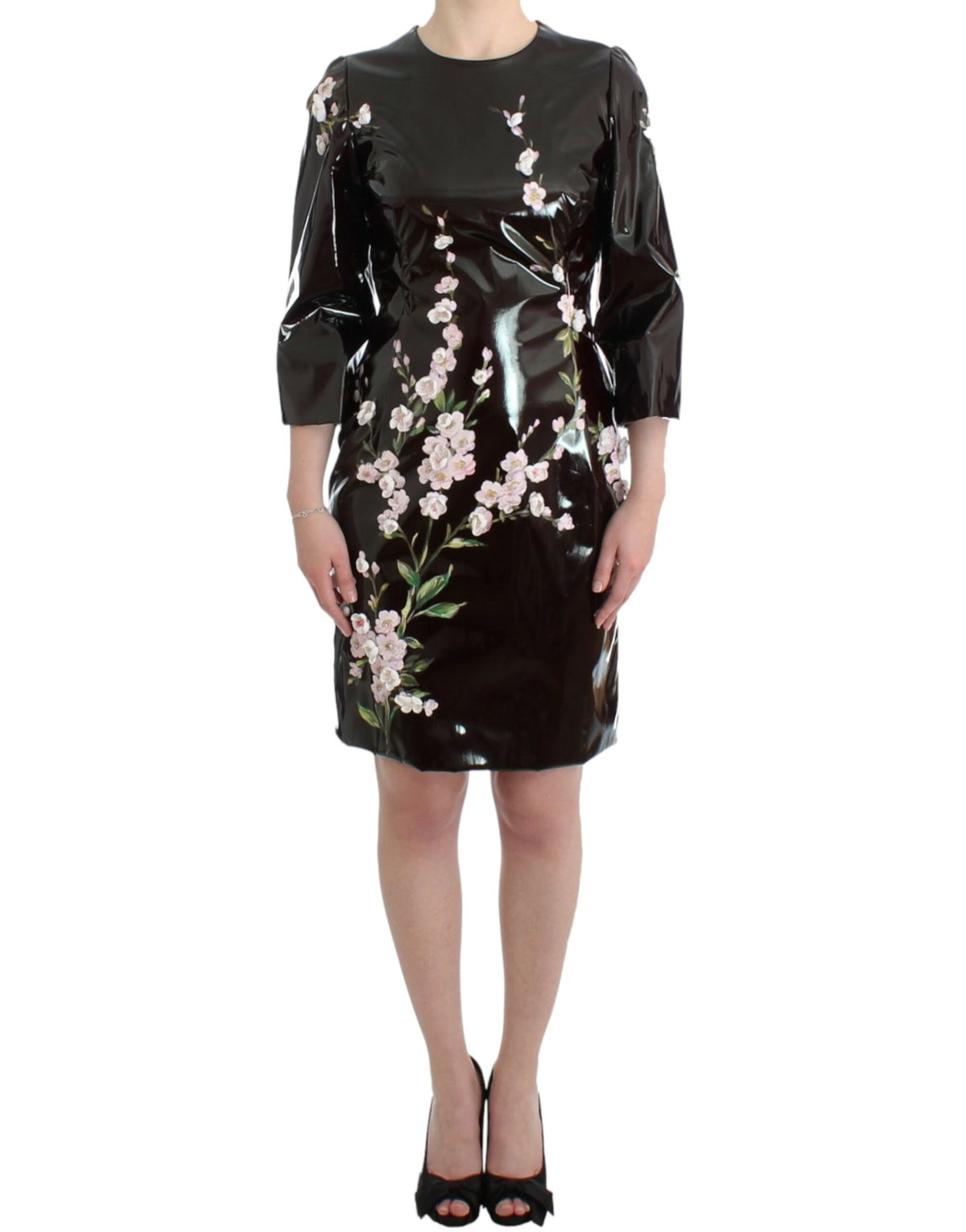 Handpainted black patent floral dress by Dolce & Gabbana, featuring intricate floral designs and glossy finish.