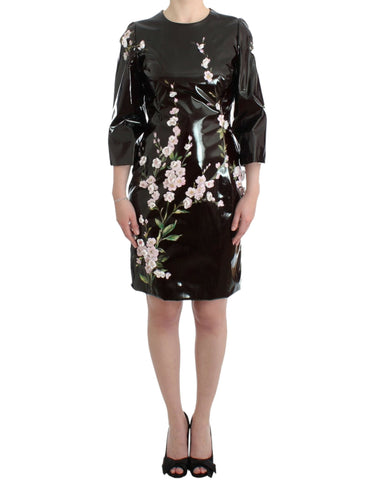Handpainted black patent floral dress by Dolce & Gabbana, featuring intricate floral designs and glossy finish.