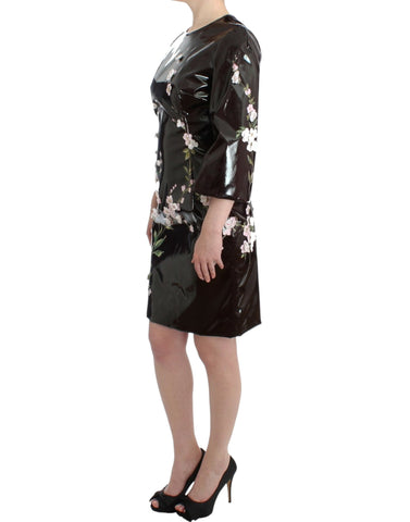 Black patent floral handpainted Dolce & Gabbana dress with intricate floral details and glossy finish.