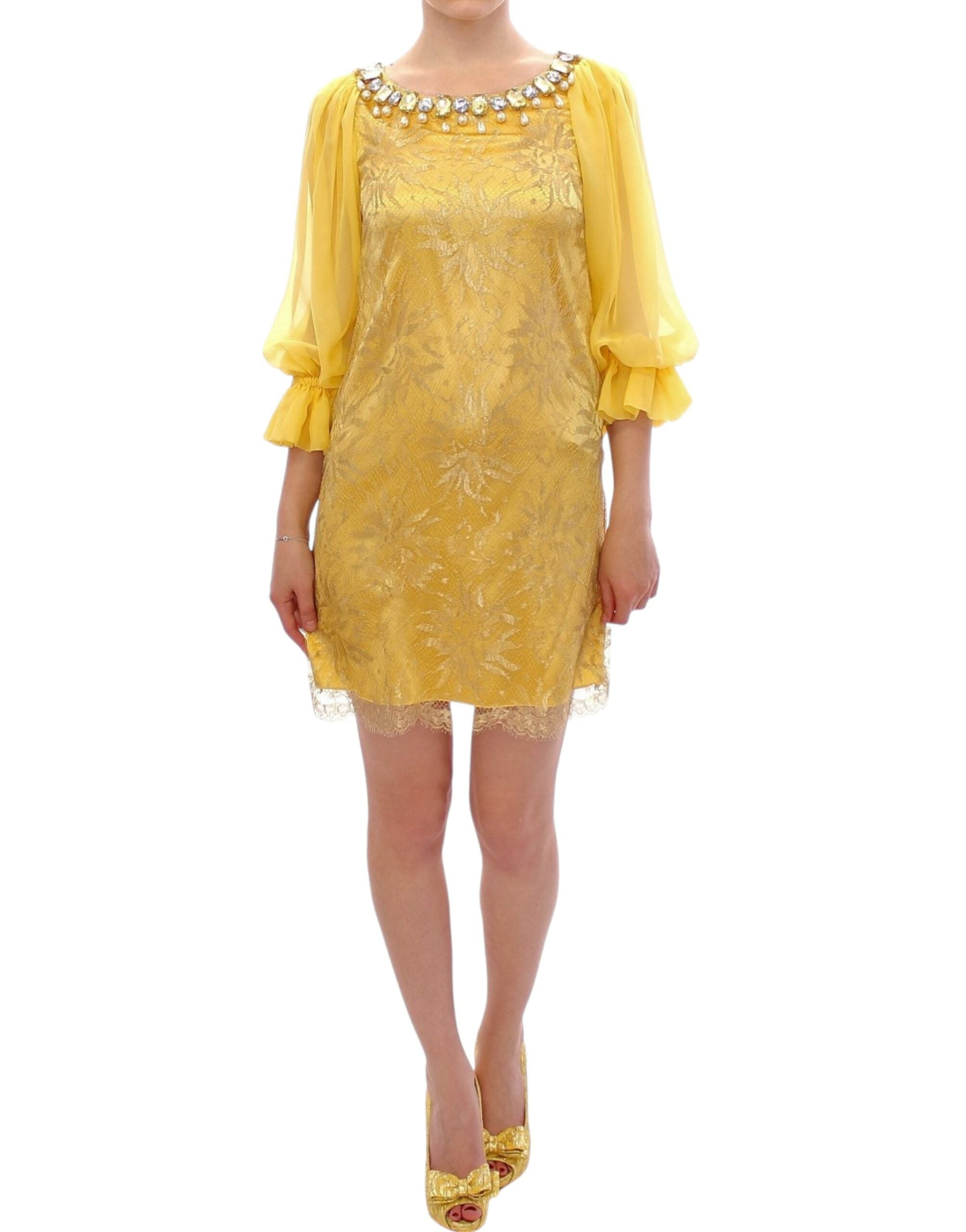 Yellow lace crystal mini dress by Dolce & Gabbana with intricate lace details and sparkling crystal embellishments.