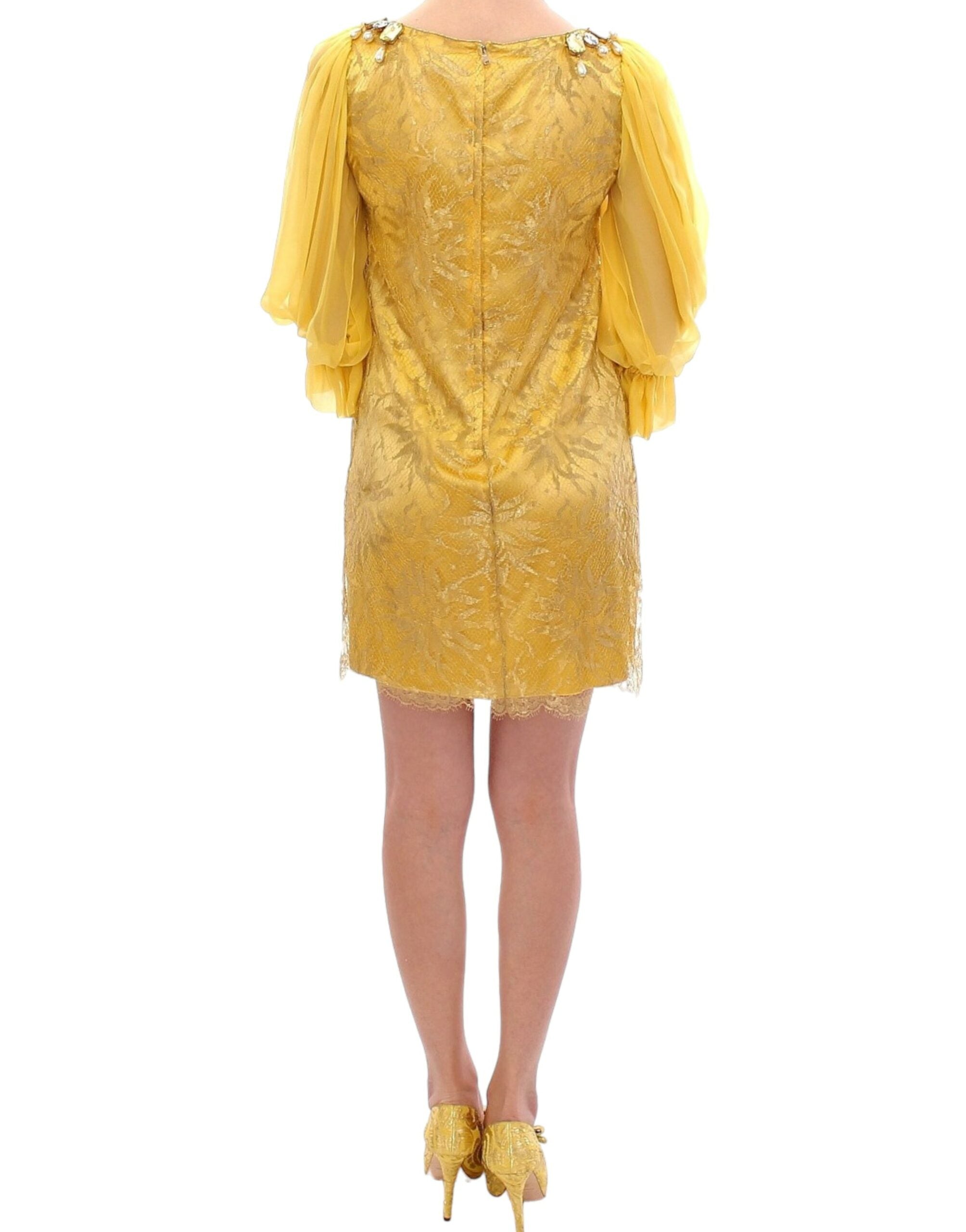 Yellow lace crystal mini dress by Dolce & Gabbana with intricate lace details and sparkling crystal embellishments.