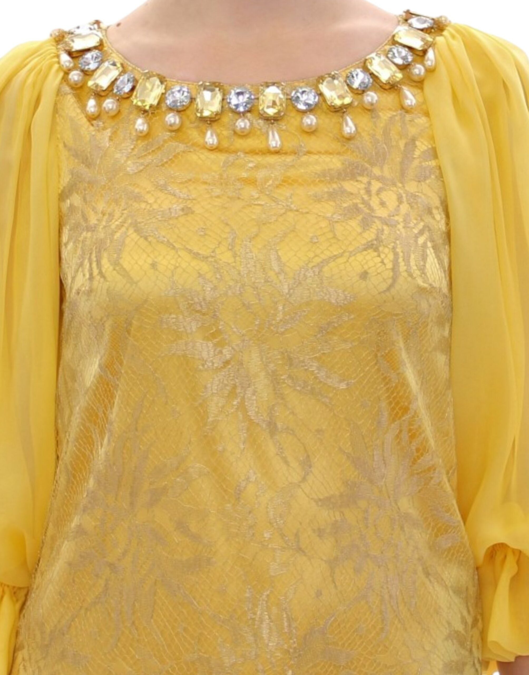 Yellow lace crystal mini dress by Dolce & Gabbana, featuring intricate lace details and sparkling crystal embellishments.