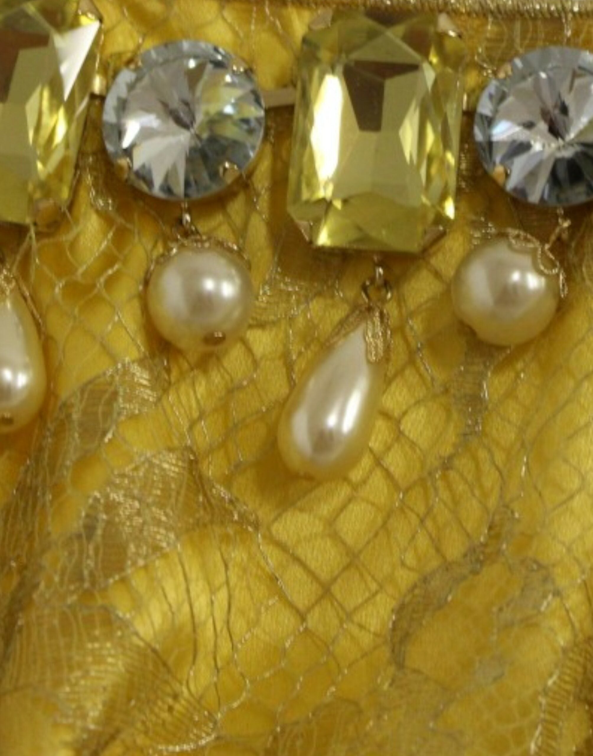 Yellow lace crystal mini dress by Dolce & Gabbana, featuring intricate lace details and sparkling crystal embellishments.