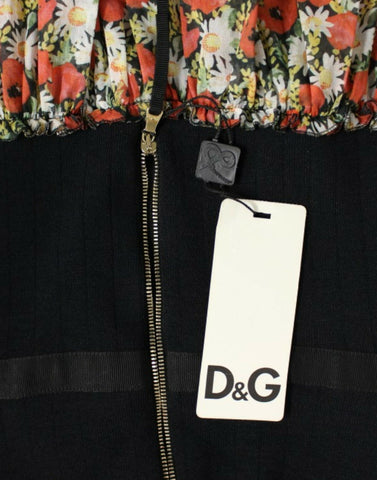 Multicolor floral bubble halterneck dress by Dolce & Gabbana displayed on a hanger with vibrant floral patterns.