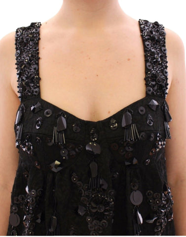Black floral crystal-embellished dress by Dolce & Gabbana, showcasing intricate floral patterns and shimmering crystal details.