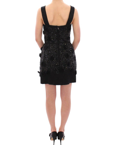 Black floral crystal-embellished dress by Dolce & Gabbana, featuring intricate floral embroidery and elegant design.