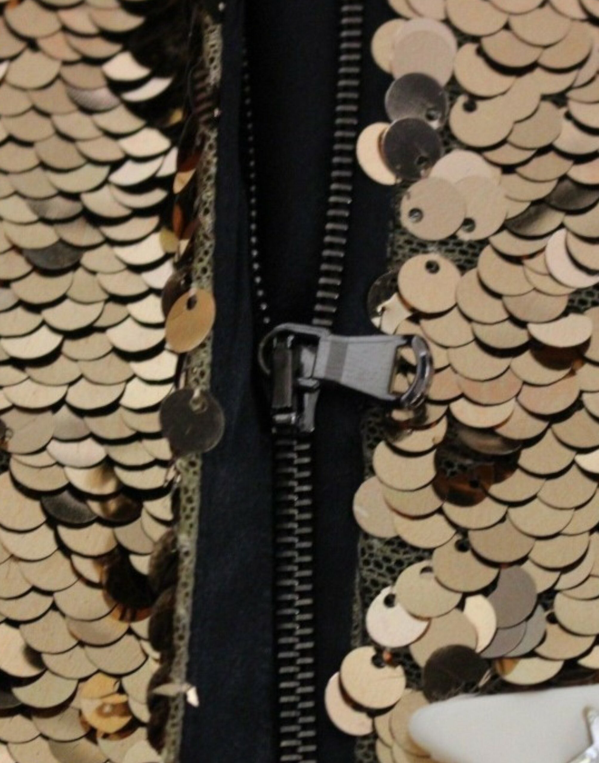 Gold sequined Swarovski crystal dress by Dolce & Gabbana, showcasing intricate embellishments and luxurious fabric.