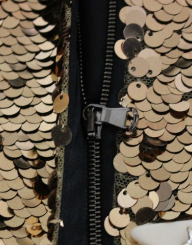 Gold sequined Swarovski crystal dress by Dolce & Gabbana, showcasing intricate embellishments and luxurious fabric.