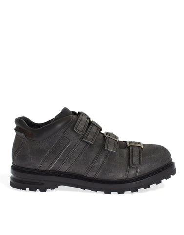 Gray leather ankle strap shoes and boots by Dolce & Gabbana with sleek design and stylish ankle straps.