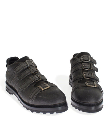 Gray leather ankle strap shoes and boots by Dolce & Gabbana, featuring sleek design and stylish ankle straps.