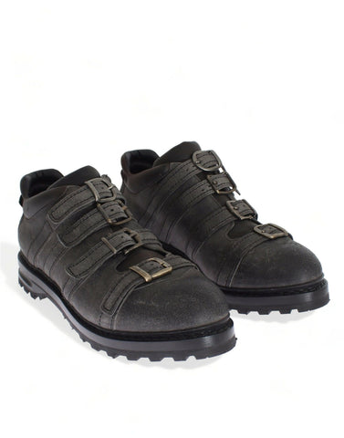 Gray leather ankle strap shoes boots by Dolce & Gabbana with sleek design and stylish ankle strap detail.