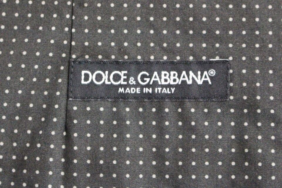 Gray polka dot dress vest by Dolce & Gabbana, sleeveless gilet with a tailored fit and classic polka dot pattern.