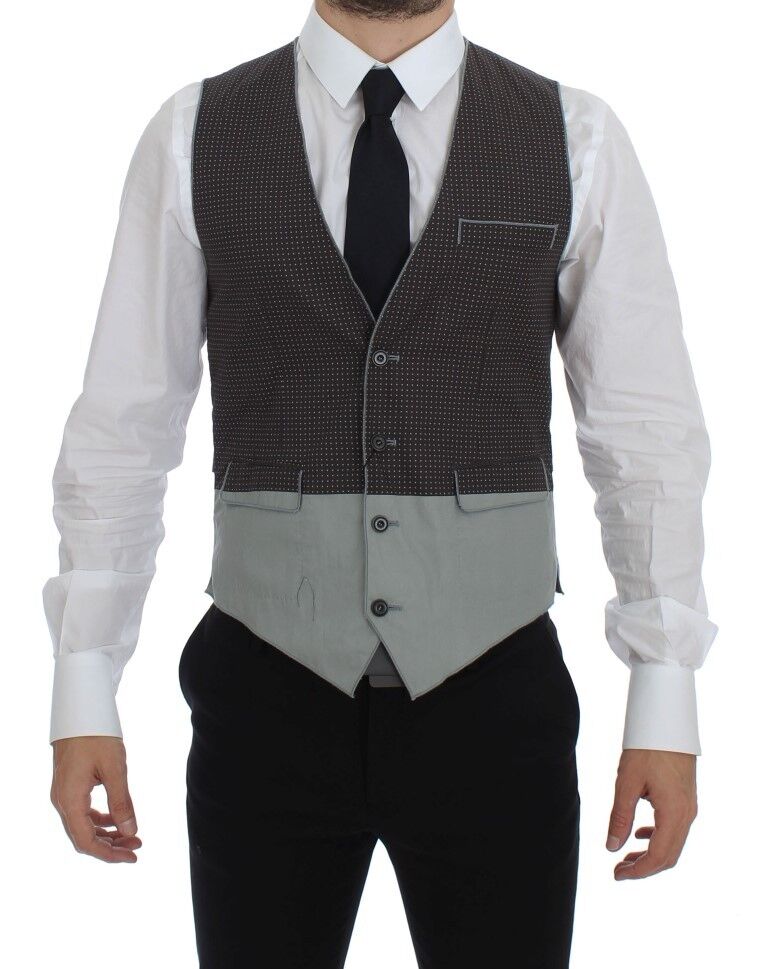 Gray polka dot dress vest gilet by Dolce & Gabbana, showing tailored fit and stylish polka dot pattern.