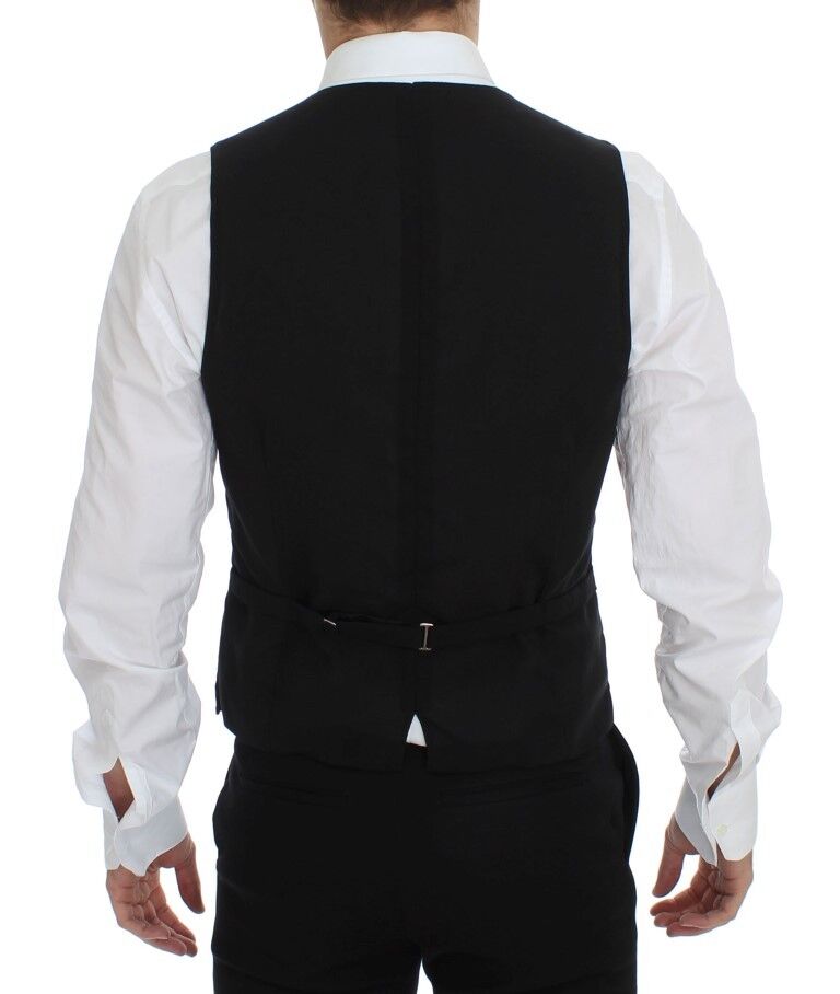 Black wool formal dress vest gilet jacket by Dolce & Gabbana, tailored fit with sleek design and classic lapel details.