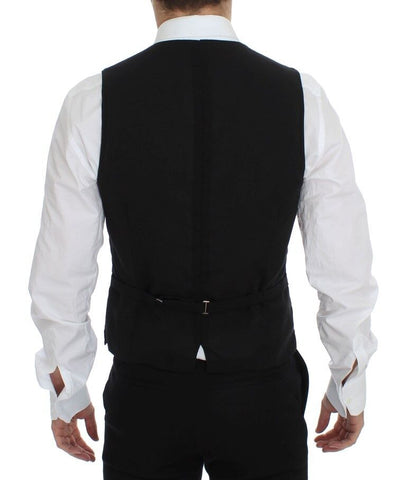 Black wool formal dress vest gilet jacket by Dolce & Gabbana, tailored fit with sleek design and classic lapel details.