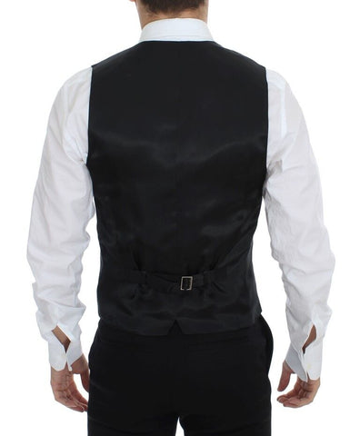 Black striped wool silk dress vest gilet by Dolce & Gabbana, featuring a tailored fit and stylish pattern.