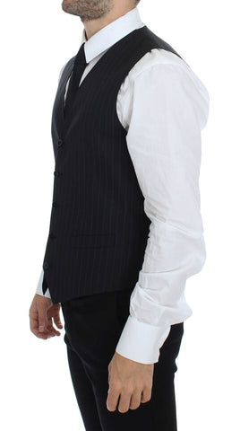 Black striped wool silk dress vest gilet by Dolce & Gabbana, showing the tailored fit and elegant pattern.