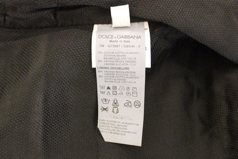 Black cotton blend dress vest gilet by Dolce & Gabbana, featuring a tailored fit and classic design, shown on a plain background.