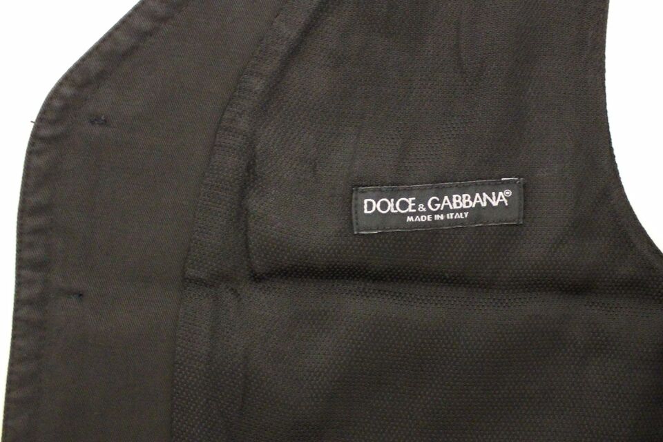 Black cotton blend dress vest gilet by Dolce & Gabbana, featuring tailored fit and sleek design, displayed on a neutral background.