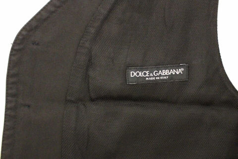 Black cotton blend dress vest gilet by Dolce & Gabbana, featuring tailored fit and sleek design, displayed on a neutral background.