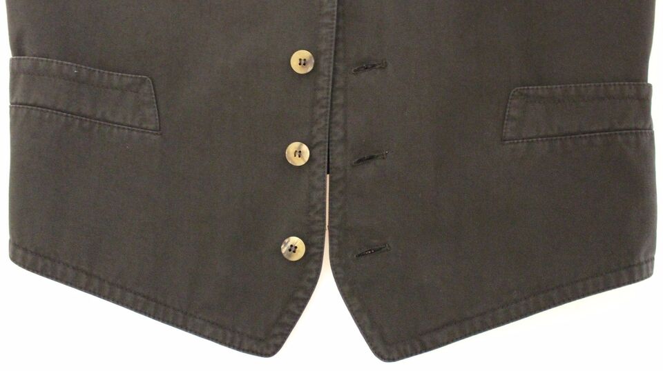 Black cotton blend dress vest gilet by Dolce & Gabbana, featuring tailored fit and sleek design, shown on a model.