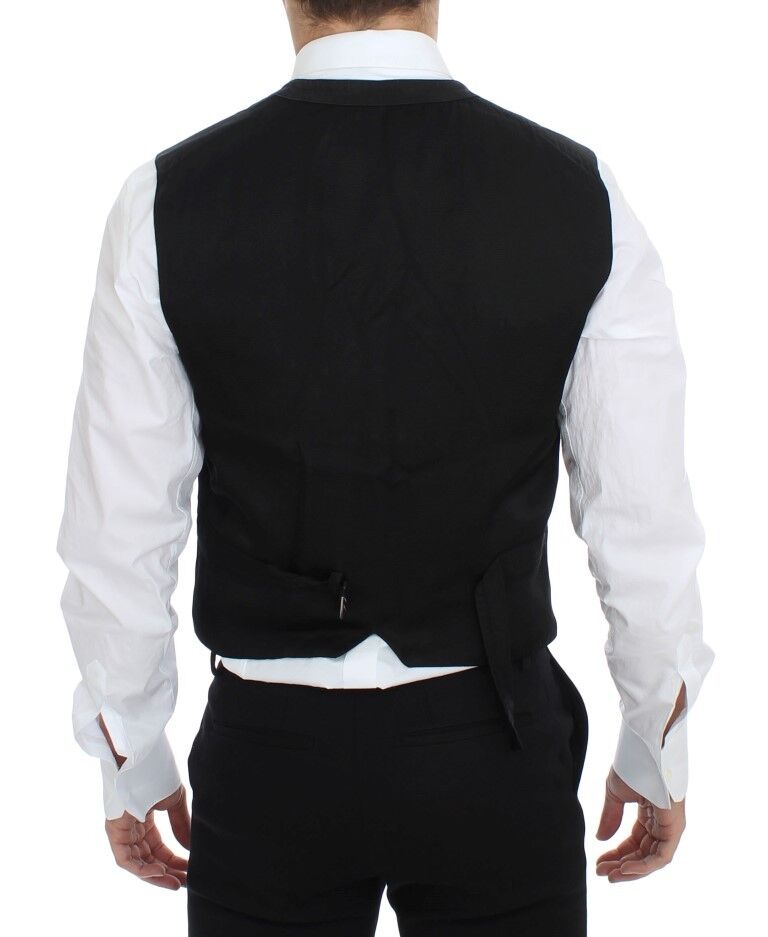 Black cotton blend dress vest gilet by Dolce & Gabbana, featuring a tailored fit and sleek design.
