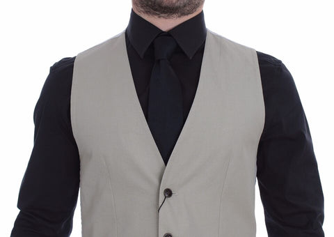 Beige silk blend formal vest gilet by Dolce & Gabbana, displayed on a mannequin. Elegant, tailored design for sophisticated occasions.