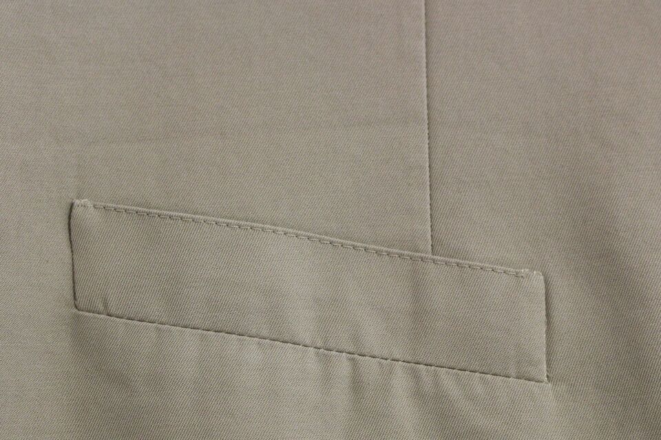 Beige silk blend formal vest gilet by Dolce & Gabbana, tailored with sleek design and smooth fabric for elegant occasion wear.