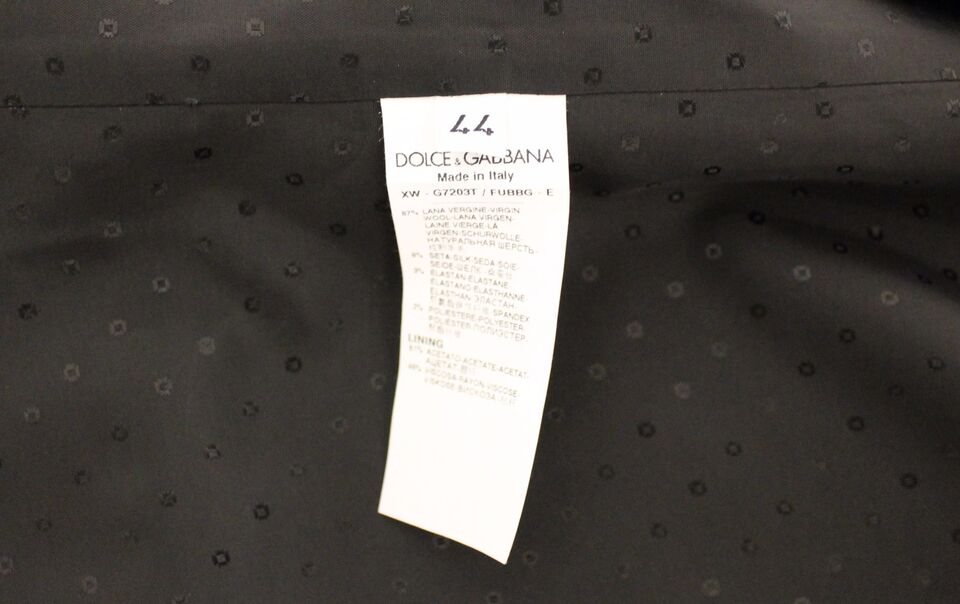 Black wool silk stretch dress vest blazer by Dolce & Gabbana, featuring tailored fit and sleek design, shown on a mannequin.