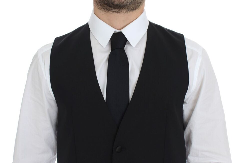 Black wool silk stretch dress vest blazer by Dolce & Gabbana, tailored fit with sleek lapels and structured design.