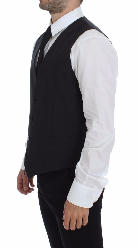 Gray slim fit formal vest with button front by Dolce & Gabbana, tailored for a sleek, modern look.
