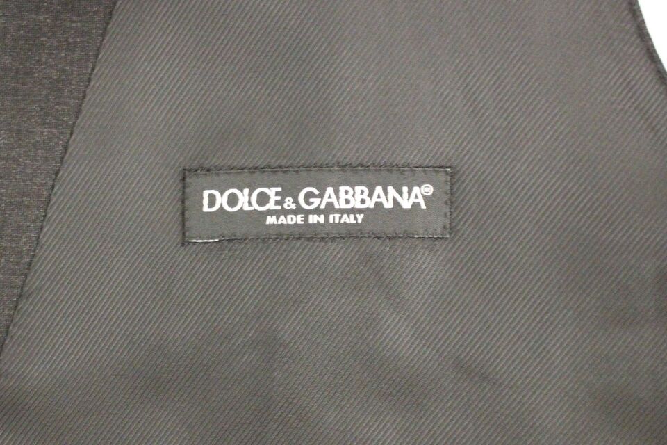 Gray slim fit formal vest with button front by Dolce & Gabbana, tailored for a sleek, modern look.
