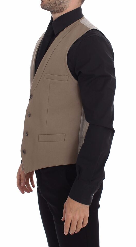 Beige cotton slim fit button-front dress vest by Dolce & Gabbana, tailored with a sleek, modern design for women's fashion.