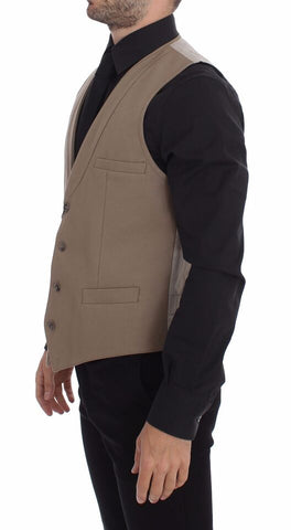 Beige cotton slim fit button-front dress vest by Dolce & Gabbana, tailored with a sleek, modern design for women's fashion.