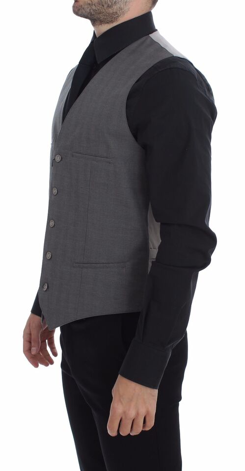Gray cotton slim fit button-front dress vest by Dolce & Gabbana, featuring a tailored design and classic collar.