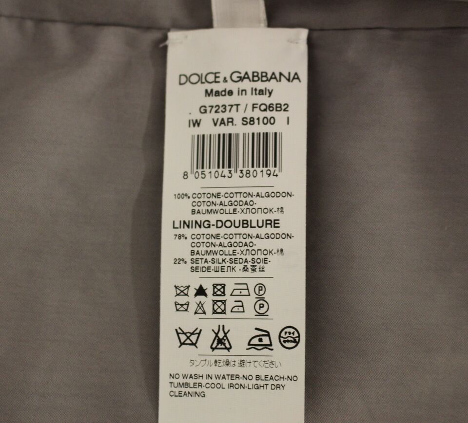 Gray cotton slim fit button-front dress vest by Dolce & Gabbana, featuring tailored design and classic collar detail.