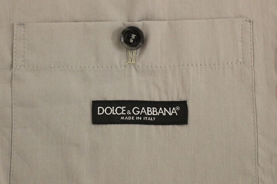 Gray cotton slim fit button-front dress vest by Dolce & Gabbana, featuring a tailored design and classic collar.