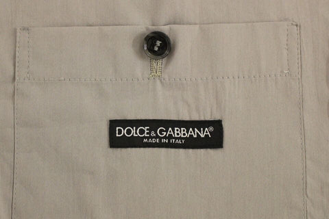 Gray cotton slim fit button-front dress vest by Dolce & Gabbana, featuring a tailored design and classic collar.