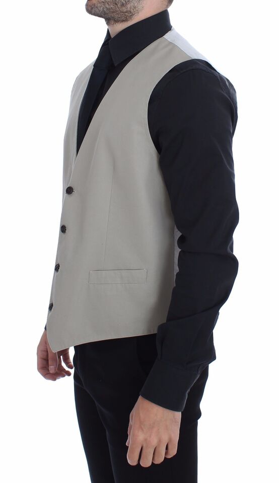 Beige cotton silk blend dress vest blazer by Dolce & Gabbana, tailored fit with lapel collar and button closure.