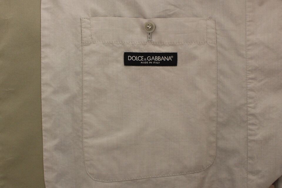 Beige cotton silk blend dress vest blazer by Dolce & Gabbana, tailored fit with lapel collar and button closure.
