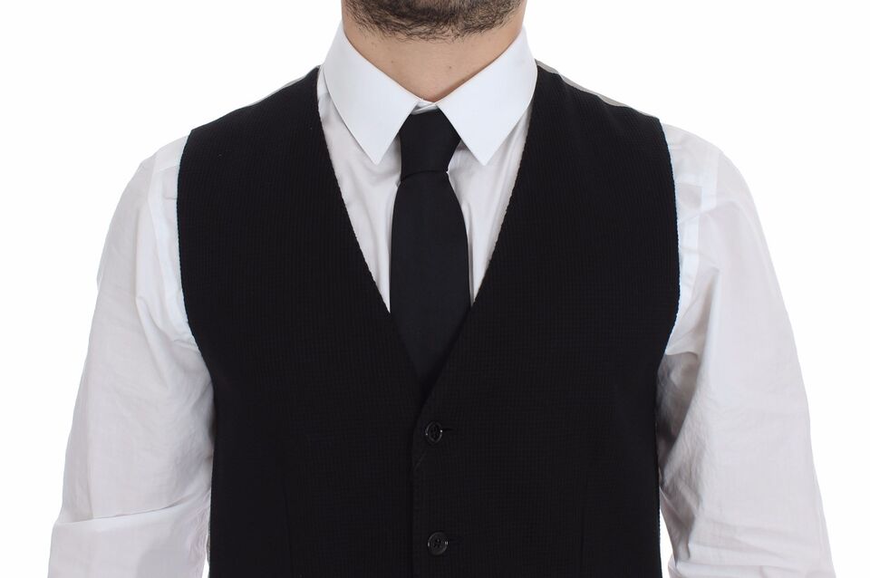 Black cotton dress vest blazer jacket by Dolce & Gabbana, tailored fit with lapel collar and sleek design, perfect for formal occasions.