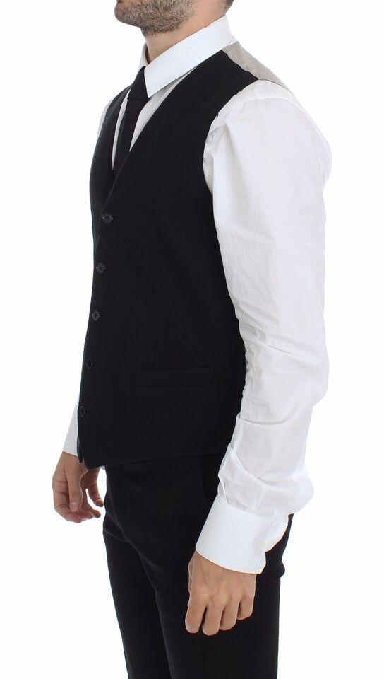 Black cotton dress vest blazer jacket by Dolce & Gabbana, tailored fit, with lapel collar and structured design.