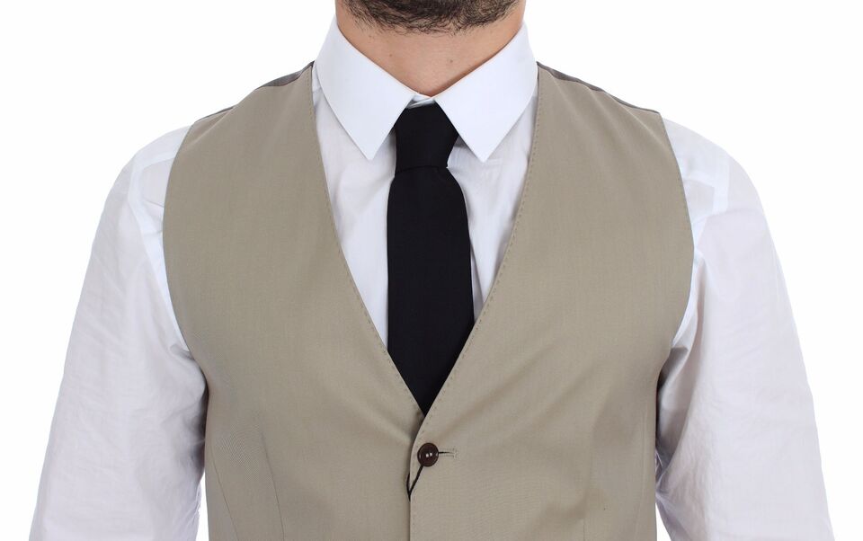 Beige cotton dress vest blazer jacket by Dolce & Gabbana, tailored fit with lapel collar and single-breasted design.