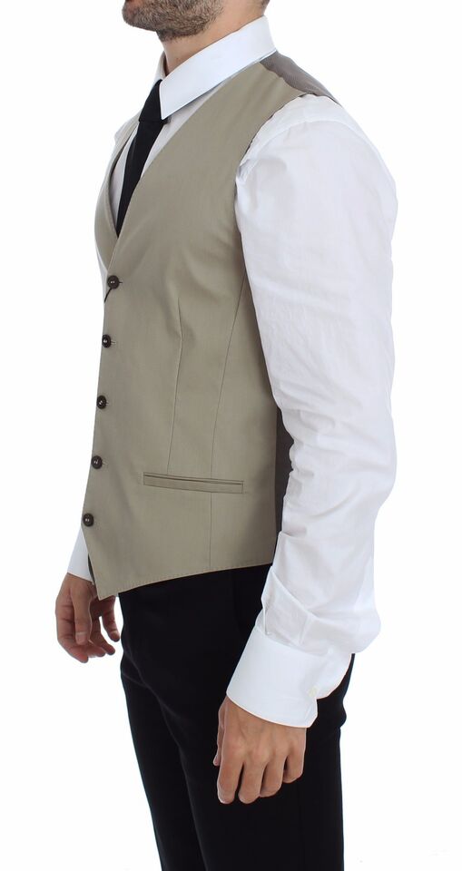 Beige cotton dress vest blazer jacket by Dolce & Gabbana, tailored fit with lapel collar and front button closure.