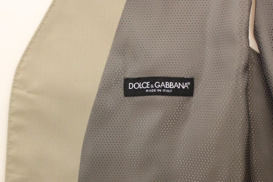 Beige cotton dress vest blazer jacket by Dolce & Gabbana, tailored fit with lapel collar and button closure, stylish and sophisticated.